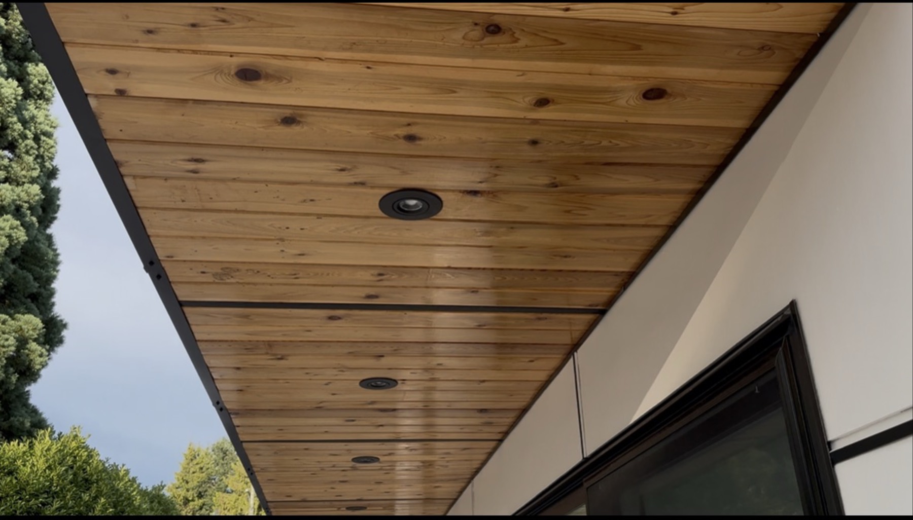 Cedar soffit detail with recessed lighting