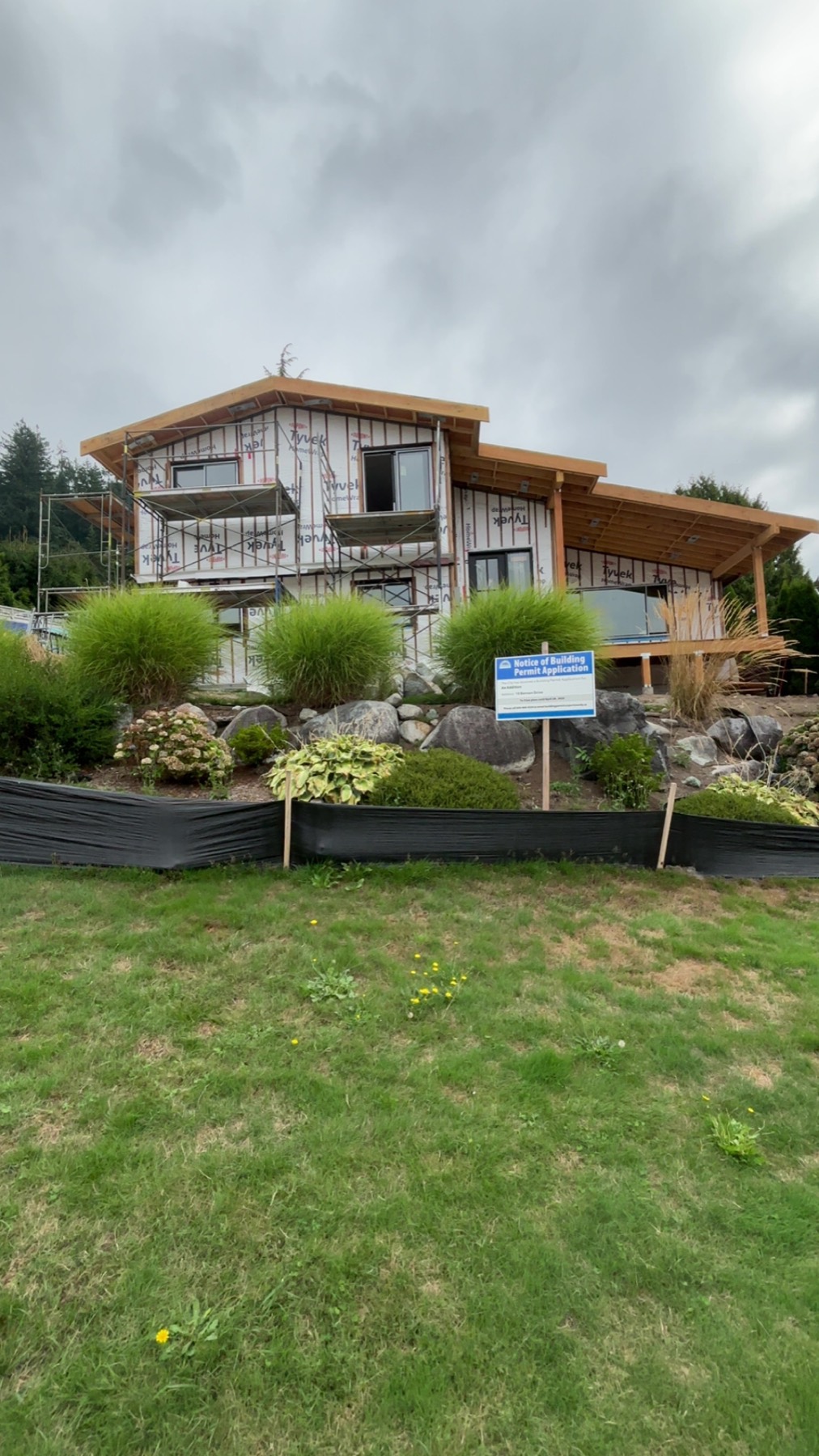 A finished home and landscaping