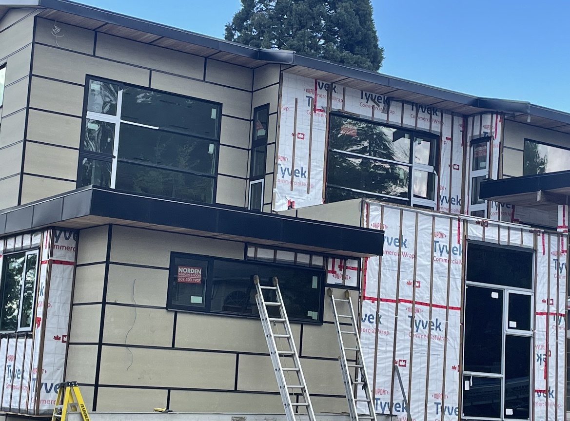 A house part way through re-cladding